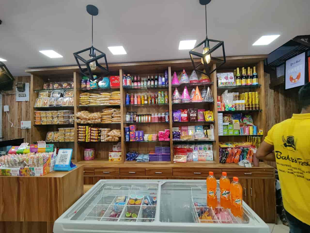 interior of baker's fresh lalpur, shelves and service counter